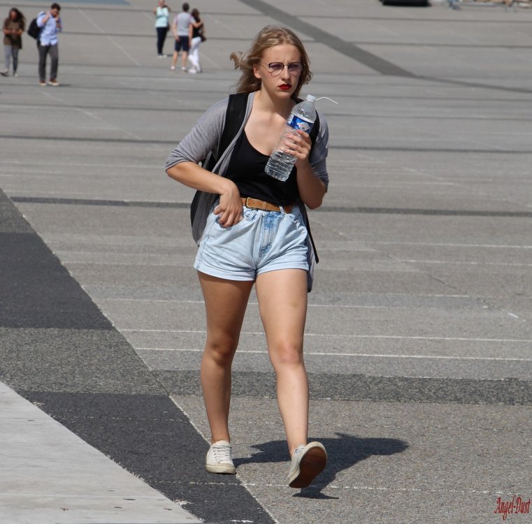Girl in shorts with a bottle of water by Angel@Dust.jpg